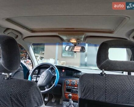 Зеленый Опель Омега, объемом двигателя 2 л и пробегом 360 тыс. км за 3000 $, фото 13 на Automoto.ua