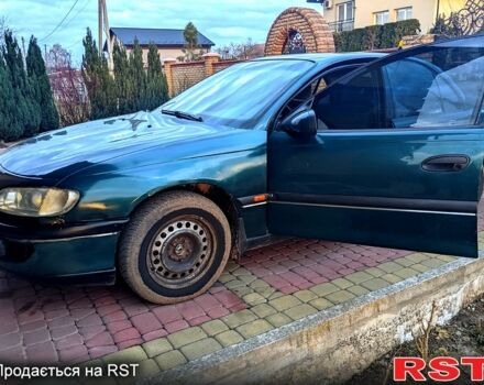 Зеленый Опель Омега, объемом двигателя 2 л и пробегом 315 тыс. км за 2400 $, фото 2 на Automoto.ua
