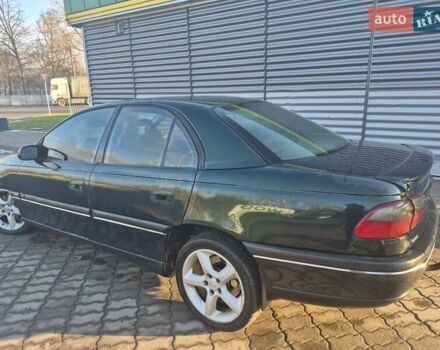 Зеленый Опель Омега, объемом двигателя 2.6 л и пробегом 270 тыс. км за 2500 $, фото 3 на Automoto.ua