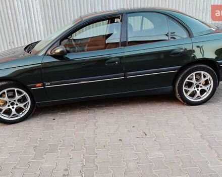 Зелений Опель Омега, об'ємом двигуна 2.6 л та пробігом 269 тис. км за 2500 $, фото 5 на Automoto.ua