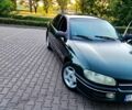 Зелений Опель Омега, об'ємом двигуна 2 л та пробігом 235 тис. км за 1899 $, фото 11 на Automoto.ua