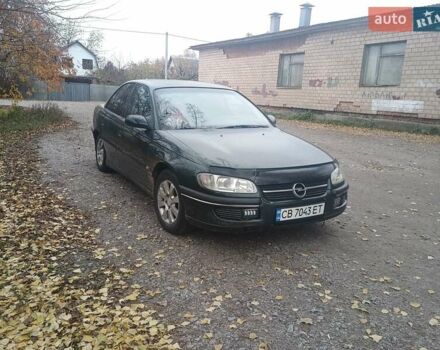 Зеленый Опель Омега, объемом двигателя 2 л и пробегом 380 тыс. км за 2800 $, фото 2 на Automoto.ua