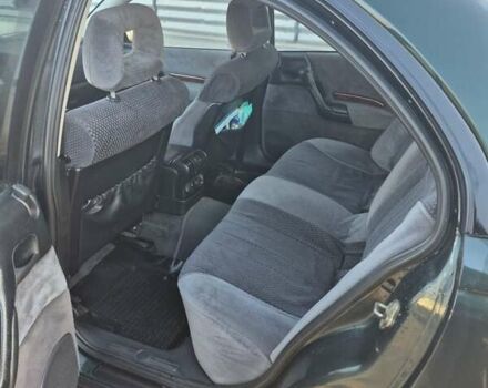 Зеленый Опель Омега, объемом двигателя 2.6 л и пробегом 270 тыс. км за 2500 $, фото 12 на Automoto.ua