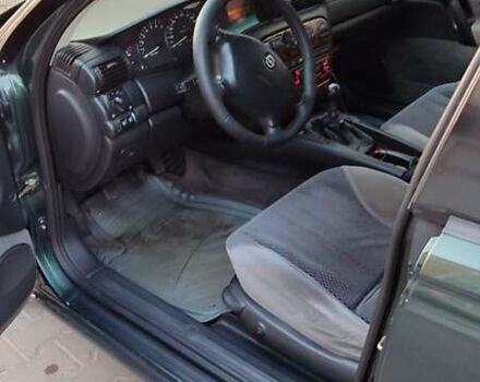 Зелений Опель Омега, об'ємом двигуна 2.6 л та пробігом 269 тис. км за 2500 $, фото 2 на Automoto.ua