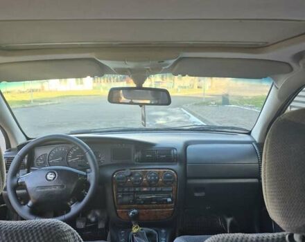 Зеленый Опель Омега, объемом двигателя 2.6 л и пробегом 270 тыс. км за 2500 $, фото 10 на Automoto.ua