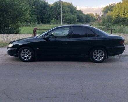 Зеленый Опель Омега, объемом двигателя 2 л и пробегом 370 тыс. км за 2700 $, фото 2 на Automoto.ua