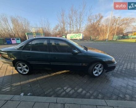 Зеленый Опель Омега, объемом двигателя 2.6 л и пробегом 270 тыс. км за 2500 $, фото 1 на Automoto.ua