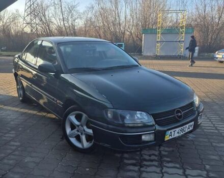 Зеленый Опель Омега, объемом двигателя 2.6 л и пробегом 270 тыс. км за 2500 $, фото 17 на Automoto.ua