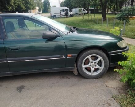 Зелений Опель Омега, об'ємом двигуна 2 л та пробігом 520 тис. км за 2000 $, фото 4 на Automoto.ua