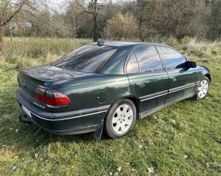 Зеленый Опель Омега, объемом двигателя 2.5 л и пробегом 333 тыс. км за 2300 $, фото 1 на Automoto.ua