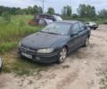 Зелений Опель Омега, об'ємом двигуна 2 л та пробігом 400 тис. км за 500 $, фото 1 на Automoto.ua