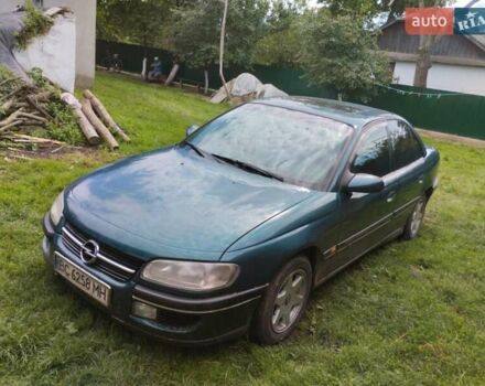 Зеленый Опель Омега, объемом двигателя 2 л и пробегом 423 тыс. км за 1500 $, фото 3 на Automoto.ua