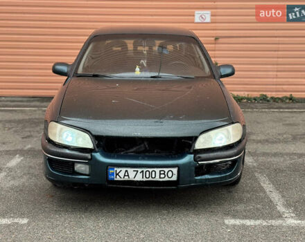 Зеленый Опель Омега, объемом двигателя 2 л и пробегом 250 тыс. км за 1250 $, фото 1 на Automoto.ua