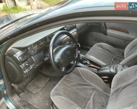 Зеленый Опель Омега, объемом двигателя 2 л и пробегом 423 тыс. км за 1500 $, фото 4 на Automoto.ua