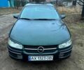 Зеленый Опель Омега, объемом двигателя 2 л и пробегом 427 тыс. км за 2150 $, фото 1 на Automoto.ua