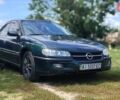 Зеленый Опель Омега, объемом двигателя 2 л и пробегом 264 тыс. км за 2600 $, фото 1 на Automoto.ua