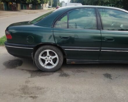 Зелений Опель Омега, об'ємом двигуна 2 л та пробігом 520 тис. км за 2000 $, фото 5 на Automoto.ua