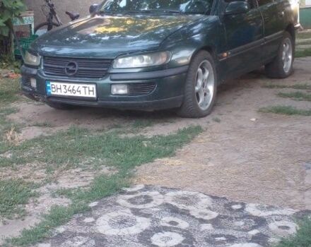 Зеленый Опель Омега, объемом двигателя 2 л и пробегом 380 тыс. км за 2100 $, фото 1 на Automoto.ua