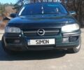 Зеленый Опель Омега, объемом двигателя 2 л и пробегом 387 тыс. км за 2450 $, фото 1 на Automoto.ua