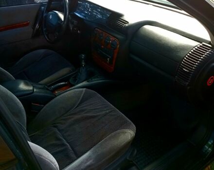 Зеленый Опель Омега, объемом двигателя 2 л и пробегом 454 тыс. км за 1777 $, фото 3 на Automoto.ua