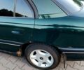 Зелений Опель Омега, об'ємом двигуна 2 л та пробігом 235 тис. км за 1899 $, фото 13 на Automoto.ua