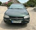 Зеленый Опель Омега, объемом двигателя 2.5 л и пробегом 300 тыс. км за 2700 $, фото 2 на Automoto.ua