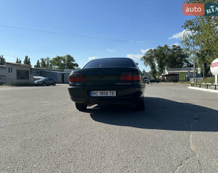 Зелений Опель Омега, об'ємом двигуна 2.5 л та пробігом 380 тис. км за 2200 $, фото 5 на Automoto.ua