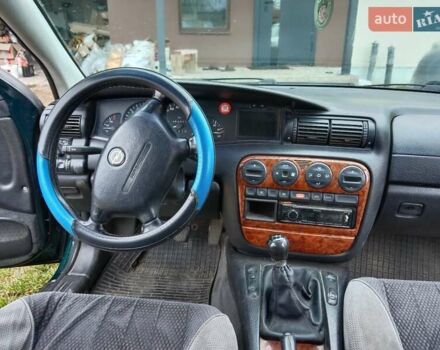 Зеленый Опель Омега, объемом двигателя 2 л и пробегом 360 тыс. км за 3000 $, фото 11 на Automoto.ua