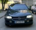 Зеленый Опель Омега, объемом двигателя 2 л и пробегом 350 тыс. км за 1550 $, фото 1 на Automoto.ua