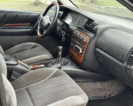 Зеленый Опель Омега, объемом двигателя 2.5 л и пробегом 180 тыс. км за 1499 $, фото 5 на Automoto.ua