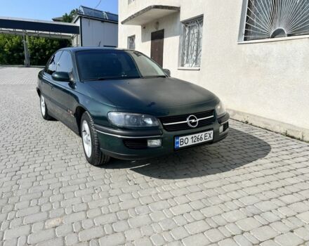 Зеленый Опель Омега, объемом двигателя 2 л и пробегом 240 тыс. км за 3500 $, фото 2 на Automoto.ua