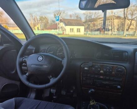 Зеленый Опель Омега, объемом двигателя 2.6 л и пробегом 270 тыс. км за 2500 $, фото 11 на Automoto.ua