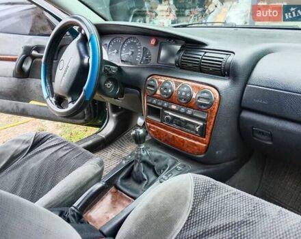 Зеленый Опель Омега, объемом двигателя 2 л и пробегом 360 тыс. км за 3000 $, фото 12 на Automoto.ua