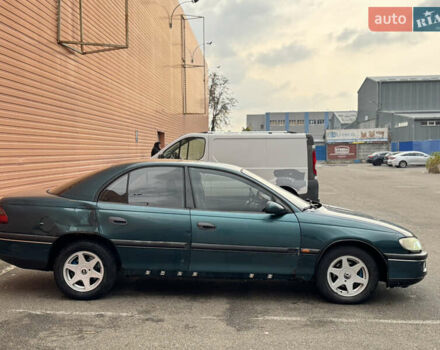 Зеленый Опель Омега, объемом двигателя 2 л и пробегом 250 тыс. км за 1250 $, фото 3 на Automoto.ua