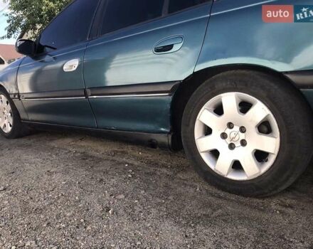 Зелений Опель Омега, об'ємом двигуна 2.5 л та пробігом 250 тис. км за 1800 $, фото 3 на Automoto.ua