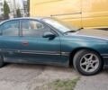 Зеленый Опель Омега, объемом двигателя 2 л и пробегом 300 тыс. км за 1000 $, фото 1 на Automoto.ua
