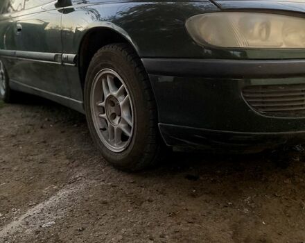 Зеленый Опель Омега, объемом двигателя 2.5 л и пробегом 412 тыс. км за 2900 $, фото 1 на Automoto.ua