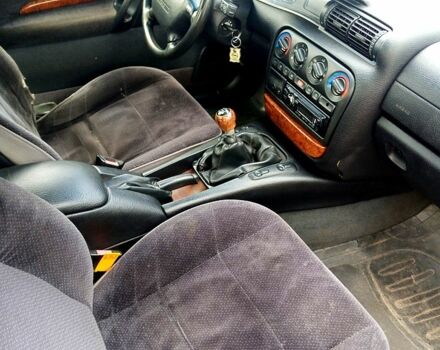 Зелений Опель Омега, об'ємом двигуна 2.5 л та пробігом 350 тис. км за 2000 $, фото 7 на Automoto.ua