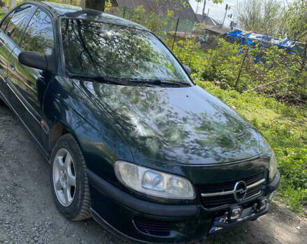 Опель Омега 1997 в Дунаевцах на Automoto.ua Зеленый Опель Омега, объемом двигателя 2 л и пробегом 290 тыс. км за 2000 $, фото 2 на Automoto.ua
