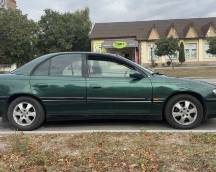 Зеленый Опель Омега, объемом двигателя 2 л и пробегом 270 тыс. км за 2200 $, фото 1 на Automoto.ua