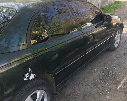 Зеленый Опель Омега, объемом двигателя 2 л и пробегом 290 тыс. км за 2100 $, фото 4 на Automoto.ua