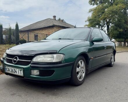 Зеленый Опель Омега, объемом двигателя 2 л и пробегом 270 тыс. км за 2200 $, фото 5 на Automoto.ua