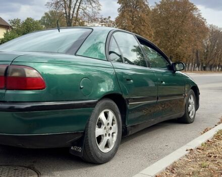 Зеленый Опель Омега, объемом двигателя 2 л и пробегом 270 тыс. км за 2200 $, фото 4 на Automoto.ua