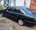 Зеленый Опель Омега, объемом двигателя 2 л и пробегом 300 тыс. км за 2300 $, фото 1 на Automoto.ua