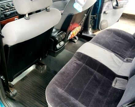 Зелений Опель Омега, об'ємом двигуна 2.5 л та пробігом 350 тис. км за 2000 $, фото 6 на Automoto.ua