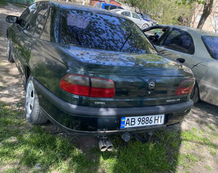 Зеленый Опель Омега, объемом двигателя 2 л и пробегом 290 тыс. км за 2100 $, фото 3 на Automoto.ua
