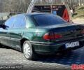 Зеленый Опель Омега, объемом двигателя 2 л и пробегом 300 тыс. км за 1750 $, фото 2 на Automoto.ua
