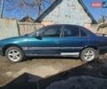 Зеленый Опель Омега, объемом двигателя 2 л и пробегом 261 тыс. км за 3000 $, фото 25 на Automoto.ua