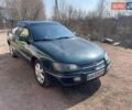 Зеленый Опель Омега, объемом двигателя 2 л и пробегом 350 тыс. км за 2500 $, фото 1 на Automoto.ua