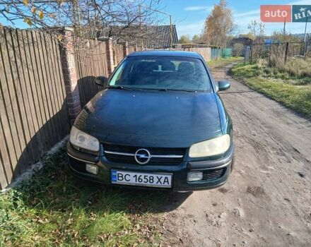 Зелений Опель Омега, об'ємом двигуна 2 л та пробігом 397 тис. км за 1000 $, фото 13 на Automoto.ua